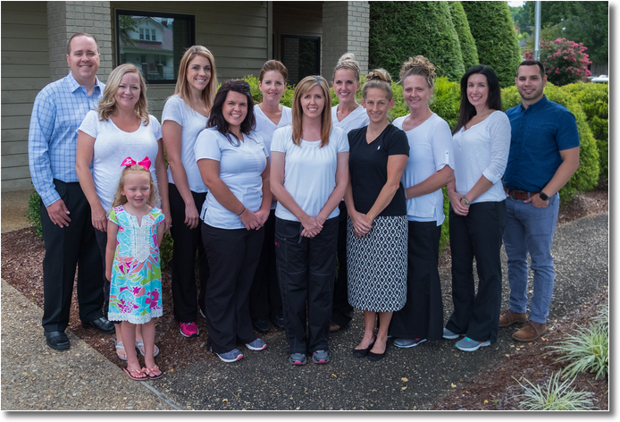 Group photo of the staff of Erwin Dental